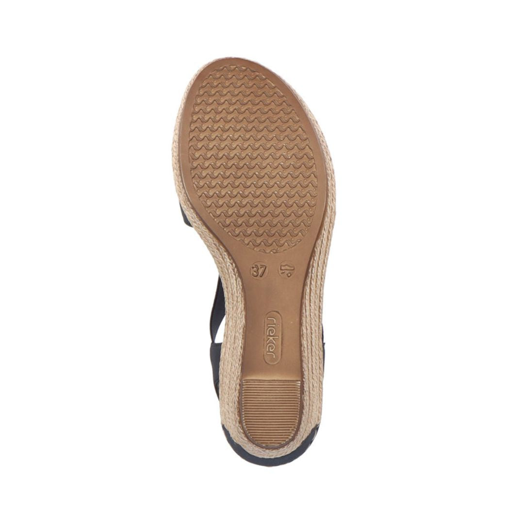 Outsole of black Rieker 624H6 Sling-Back Wedge Sandal with textured grip. Designed for traction and durability.