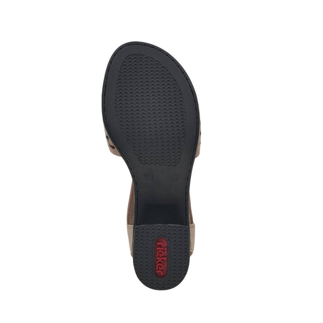 Bottom sole of taupe Women's Rieker 64677 Sling-Back Heeled Leather Sandal with non-slip rubber outsole and Rieker branding.