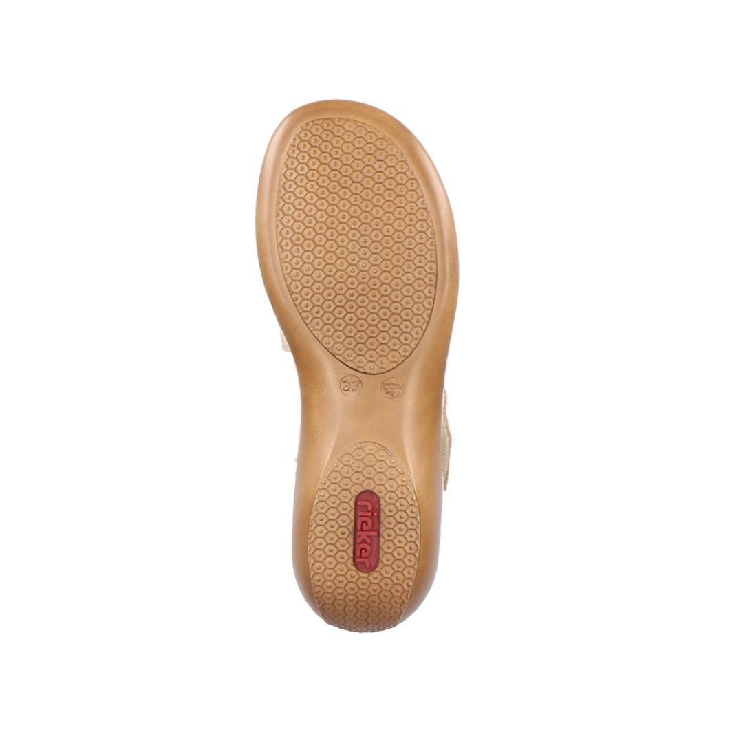 Outsole of white Rieker 659C7 sandal showing non-slip rubber sole with textured grip for stability and comfort.