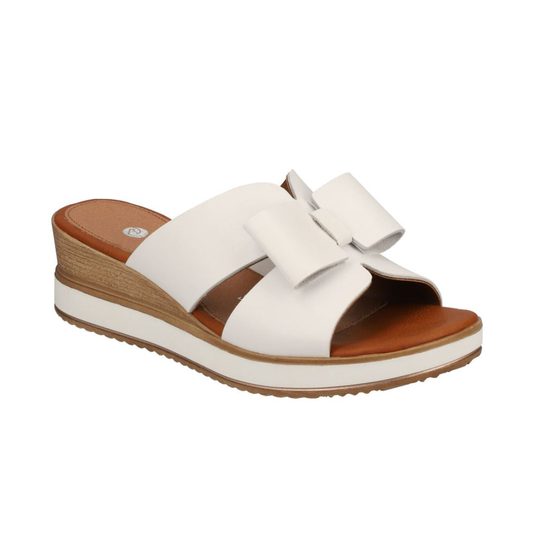 White leather slide wedge sandal with bow.