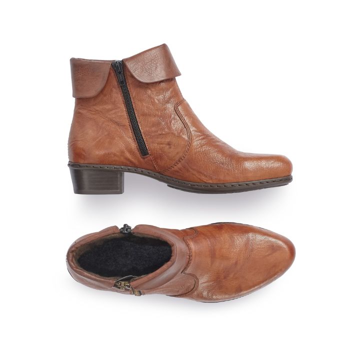 A pair of brown Rieker ankle boots with side zippers on both sides, folded down cuff, detailed stitching, and a low heel.