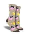 Beige socks with cats sitting in tea cups.