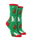 Green socks with yetis kissing under the mistle toe
