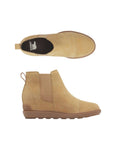 Top and side view of tan Women's Sorel Evie Pull On Wedge Boot highlighting pull tab, elastic side panels, and cushioned wedge sole.