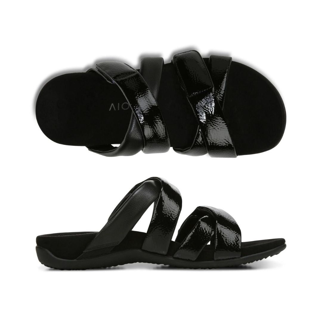 Top and side view of black leather and patenet slip-on sandal made by Vionic.