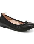 Black leather ballerina flat with bow on toe.
