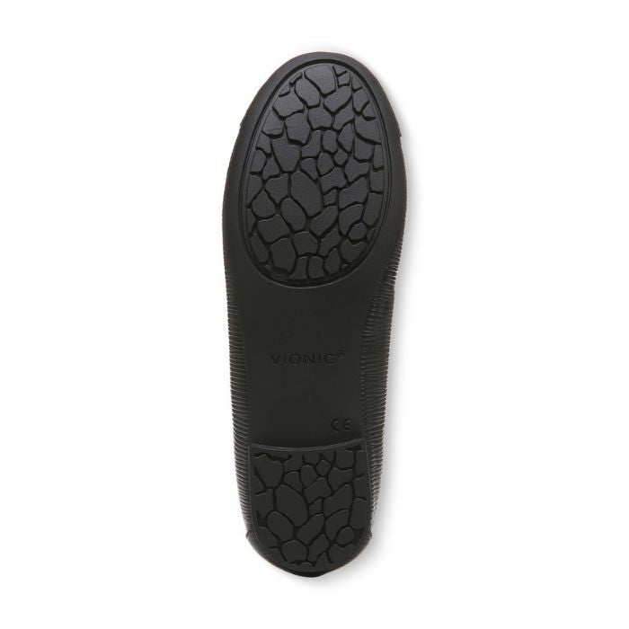 Black rubber outsole of women&#39;s ballerina flat with Vionic logo on center.