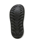 Outsole of Vionic Rejuvenate Recovery Slide Sandal with deep traction pattern for stability and slip resistance on various surfaces.