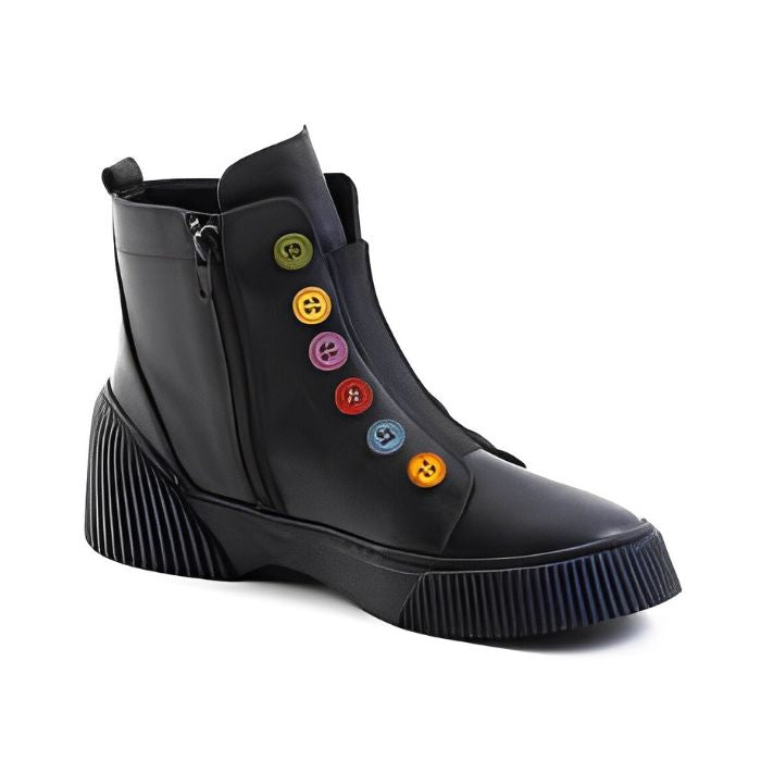Black leather ankle boots with black platform outsole and inside zipper closure. Multi-coloured buttons run up front of boot.