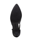Black rubber outsole of pointed to kitten heel pump with Clarks logo imprinted in center.