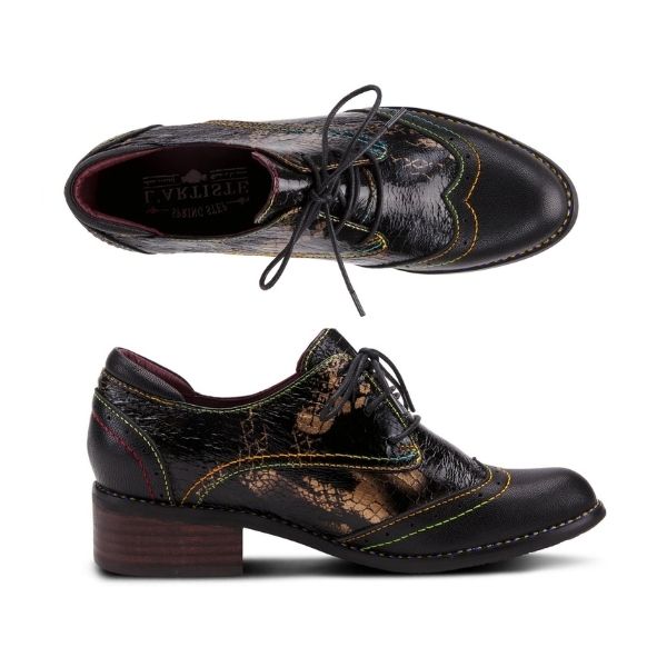 Top and side view of L'Artiste's black snake print lace-up shoe with stacked heel.