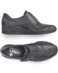 Top and side view of black Rieker 537C0 women's slip-on shoes featuring flexible sole and patterned upper for casual comfort.