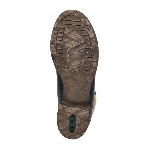 Brown rubber outsole with green Remonte logo on heel.