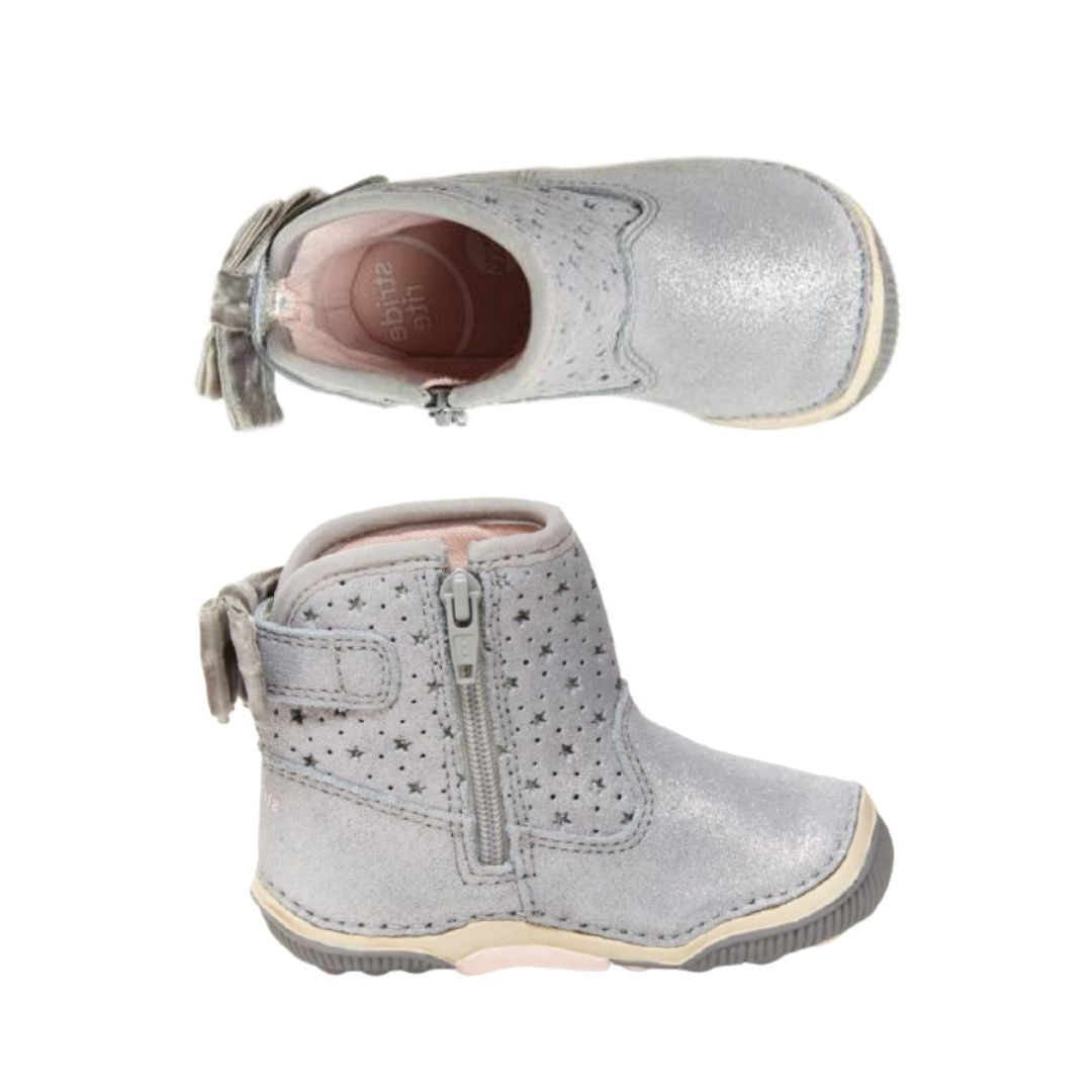 Top and side view of Silver ankle boot with star design and inside zipper