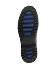 Black outsole of Bos&Co's Dax boot showing nine blue ice grips.