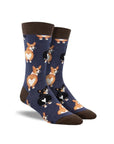 Navy socks with black and brown corgi dogs looking over their iconic heart butts.