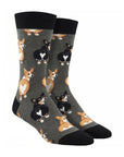 Charcoal socks with black and brown corgi dogs looking over their iconic heart butts.