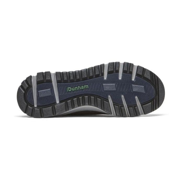 Outsole of brown Dunham Glastonbury Ubal II Sneaker featuring deep grooves for superior grip and waterproof outdoor wear.