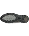 Bottom view of brown All Rounder Rake Off-Tex men's sneaker with shock-absorbing rubber outsole designed for all-terrain grip.