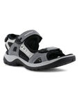 An Ecco Yucatan light and dark grey nubuck sandal with black accents on velcro heel, instep and toe straps. Footbed and outsole are black, midsole is grey.