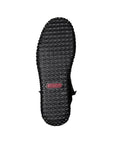 Black treaded outsole on women's ankle boot