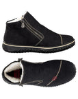 White thick lining in a black ankle boot with grey stitching details, few small red square designs and a front side zipper from top and side view
