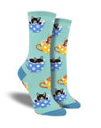 Blue socks with cats sitting in tea cups.