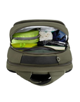 Green backpack with compartments open, showing various items fitting inside.