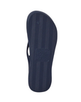 Light treaded navy thong sandal outsole.