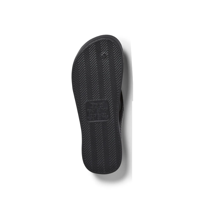 Light treaded outsole of black foam thong sandal.