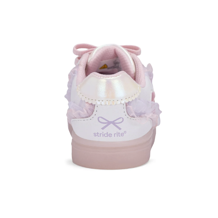 Heel of light pink and white kid's sneaker with ruffled details, the 'stride rite' logo and iridescent heel.