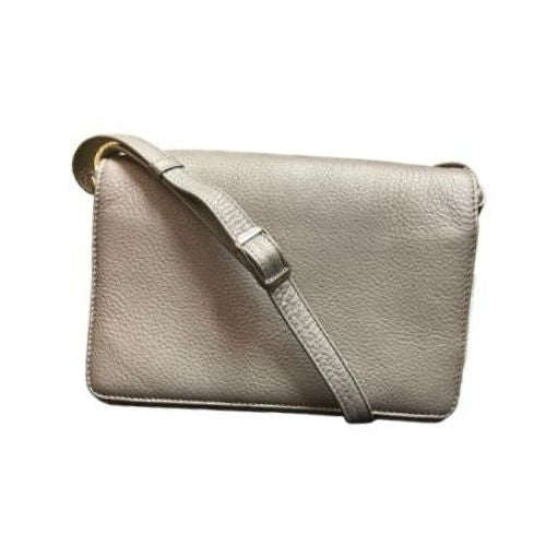 Pewter handbag with adjustable crossbody strap.