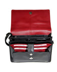 The inside of the black leather handbag is bright red and has pockets for cards, phone and money.