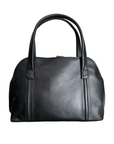 Black leather handbag with stitched lines and thick handles.