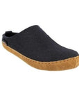 Navy wool slide slipper with brown suede outsole stitched onto it.