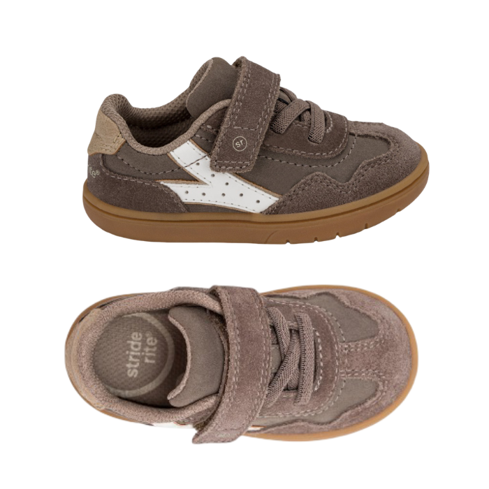 Pair of toddler's low-top sneakers in brown suede with a hook-and-loop strap closure, elastic lacing, a white accent Y shaped stripe on side and a tan outsole.