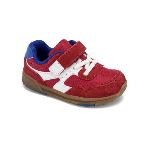 A red toddler's hook-and-loop sneaker with white accents, blue lining,  padded collar, white elastic lacing, and a brown gum outsole.