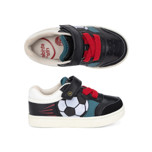Pair of toddler's low-top black sneakers with a soccer ball graphic that lights up, teal accent panels, red towel elastic laces, a hook-and-loop strap closure and white outsole.