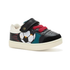 A toddler's low-top black sneaker with a soccer ball graphic that lights up, teal accent panels, red towel elastic laces, a hook-and-loop strap closure and white outsole.