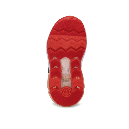 Bright orange outsole of kid's sneaker with zig-zag tread pattern. 