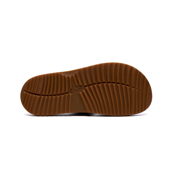 Brown deep treaded sandal outsole with Clarks logo in middle.
