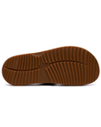 Brown deep treaded sandal outsole with Clarks logo in middle.