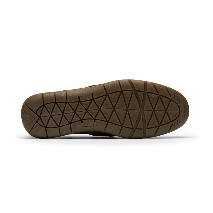 Brown geometric patterned outsole with Clarks logo stamped on side.