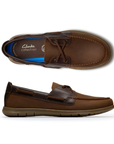 Pair of Brown boat shoe with dark accents, brown laces, "Clarks Collection" on footbed and brown outsole.