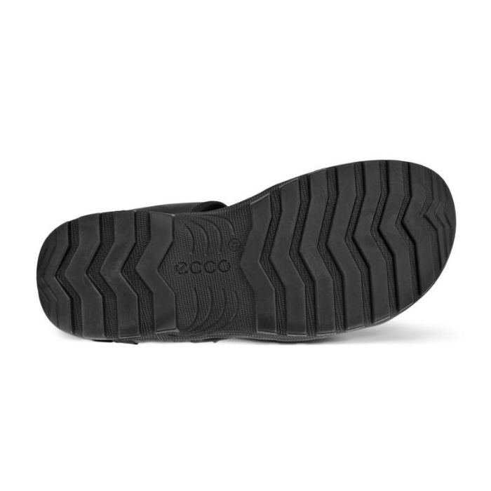 Black treaded outsole with Ecco logo in middle.