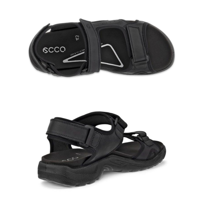 Pair of black walking sandals with three adjustable Velcro straps, Ecco logo'd black footbed and treaded black outsole.