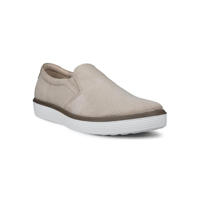 Beige slip-on shoe with light perforations and a white outsole.