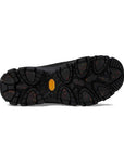 Black rubber Outsole with Vibram traction plugs and yellow logo in center.