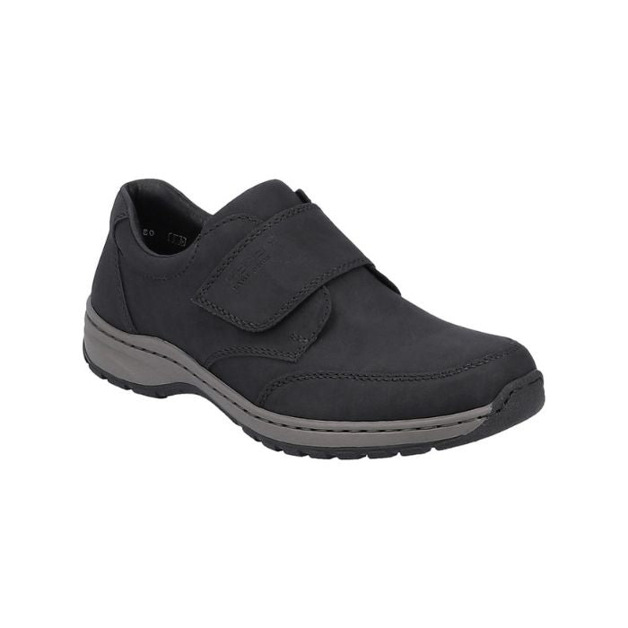 Black shoe with Velcro closure and grey midsole.