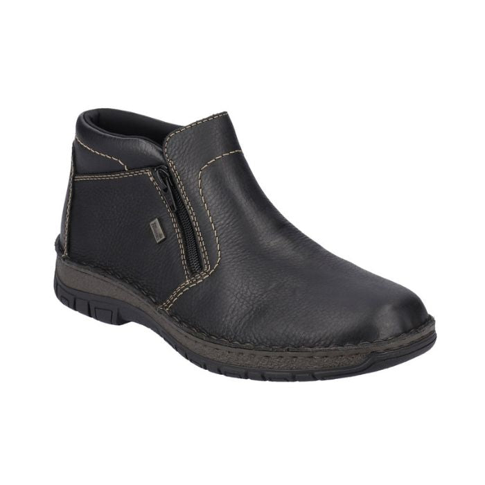 Black leather ankle boot with beige contrast stitching, outside zipper closure and brown midsole.